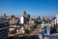 Aerial view of high-rise buildings on a sunny day in Nairobi.