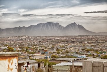 Khayelitsha, an informal settlement in Cape Town, with Table Mountain in the background