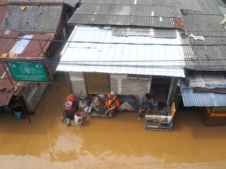 Flooding in an informal settlement in Jakarta, Indonesia