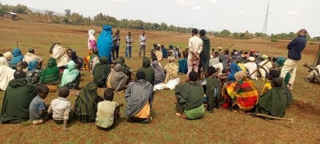 Ethiopian community members gather to learn about planting for restoration