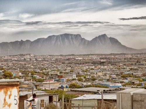 Khayelitsha, an informal settlement in Cape Town, with Table Mountain in the background